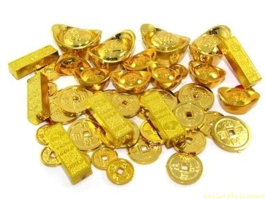 barras de ouro e moedas como amuletos da sorte